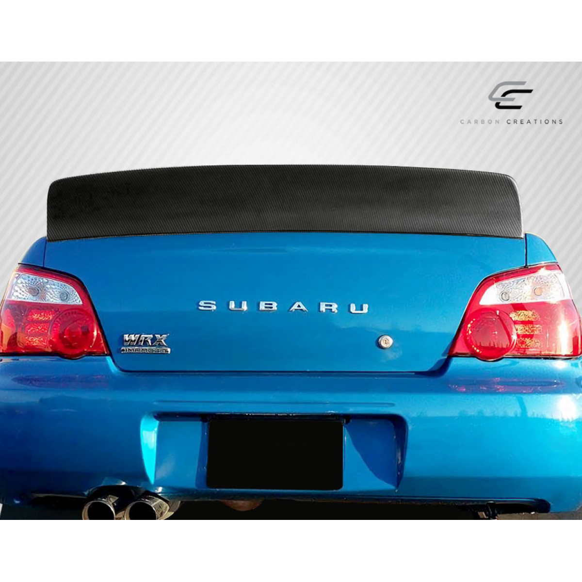 Modify your Subaru Impreza 2002 with our Exterior/Wings - Rear view at a slight angle