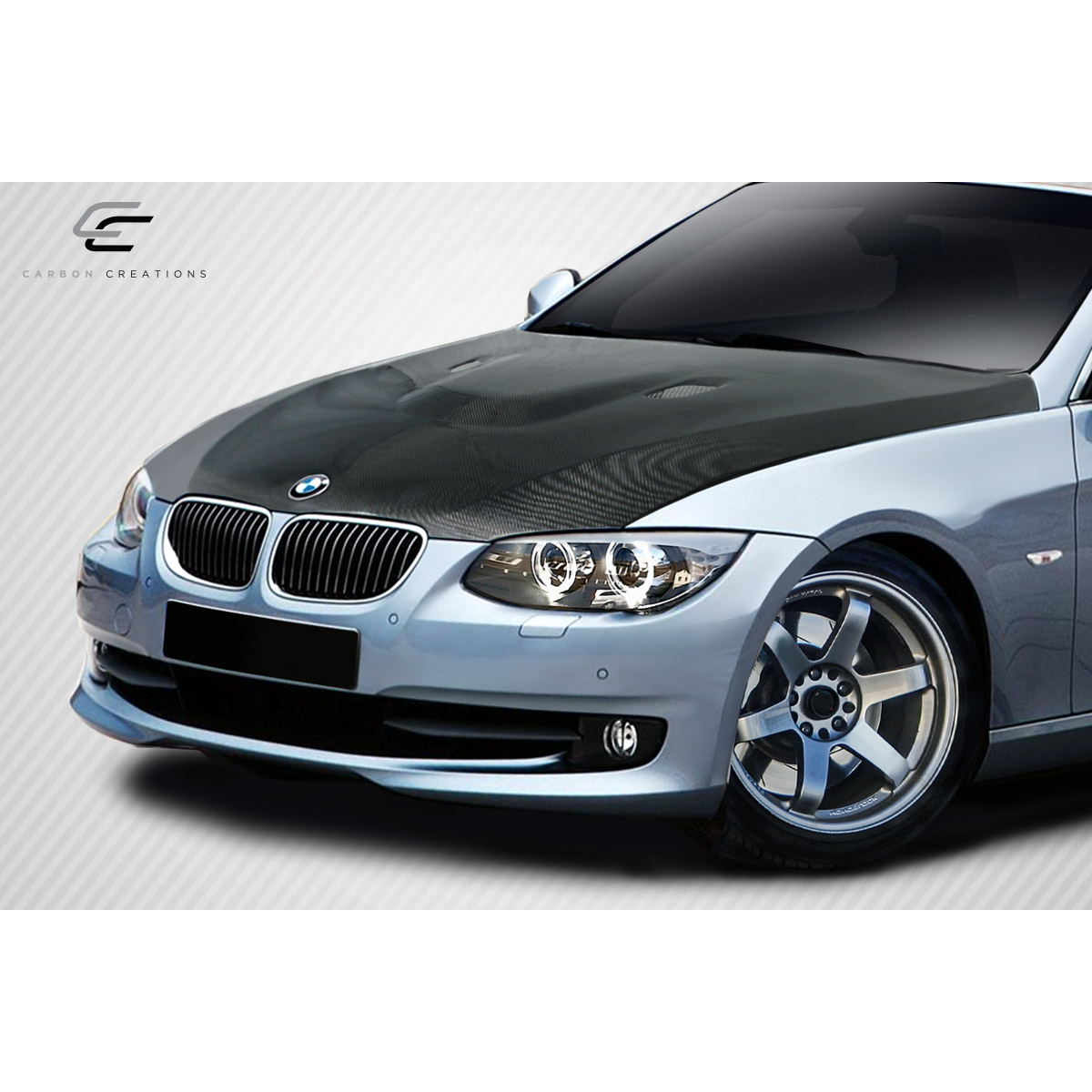 Modify your BMW 3-Series 2011 with our Exterior/Hoods - Slightly angled front view of the vehicle