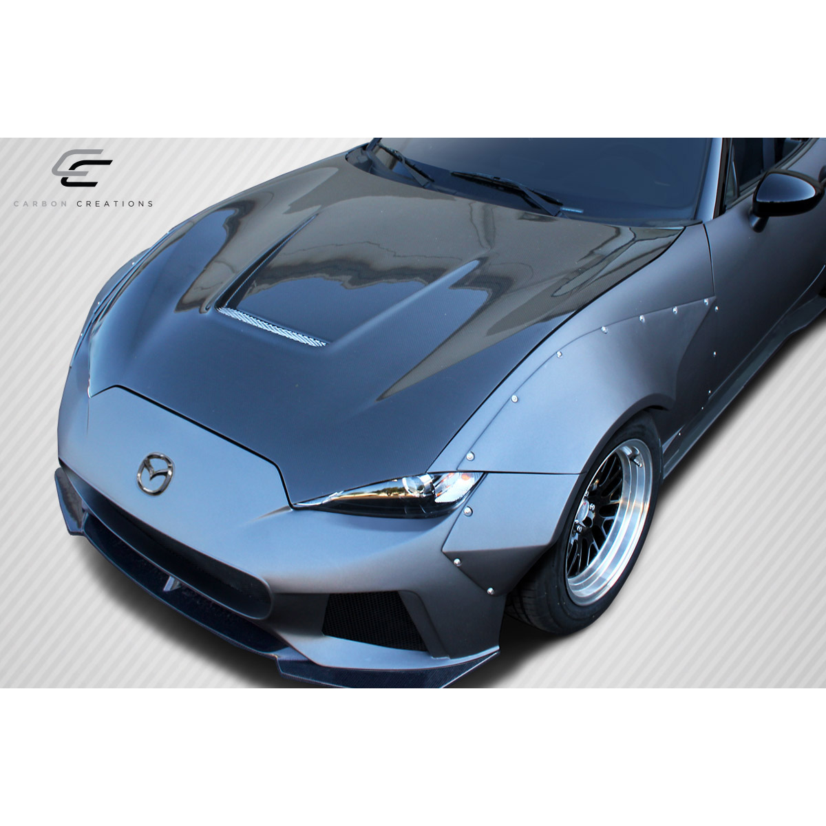 Modify your Mazda Miata 2016 with our Exterior/Hoods - Angle showing top view of the car hood