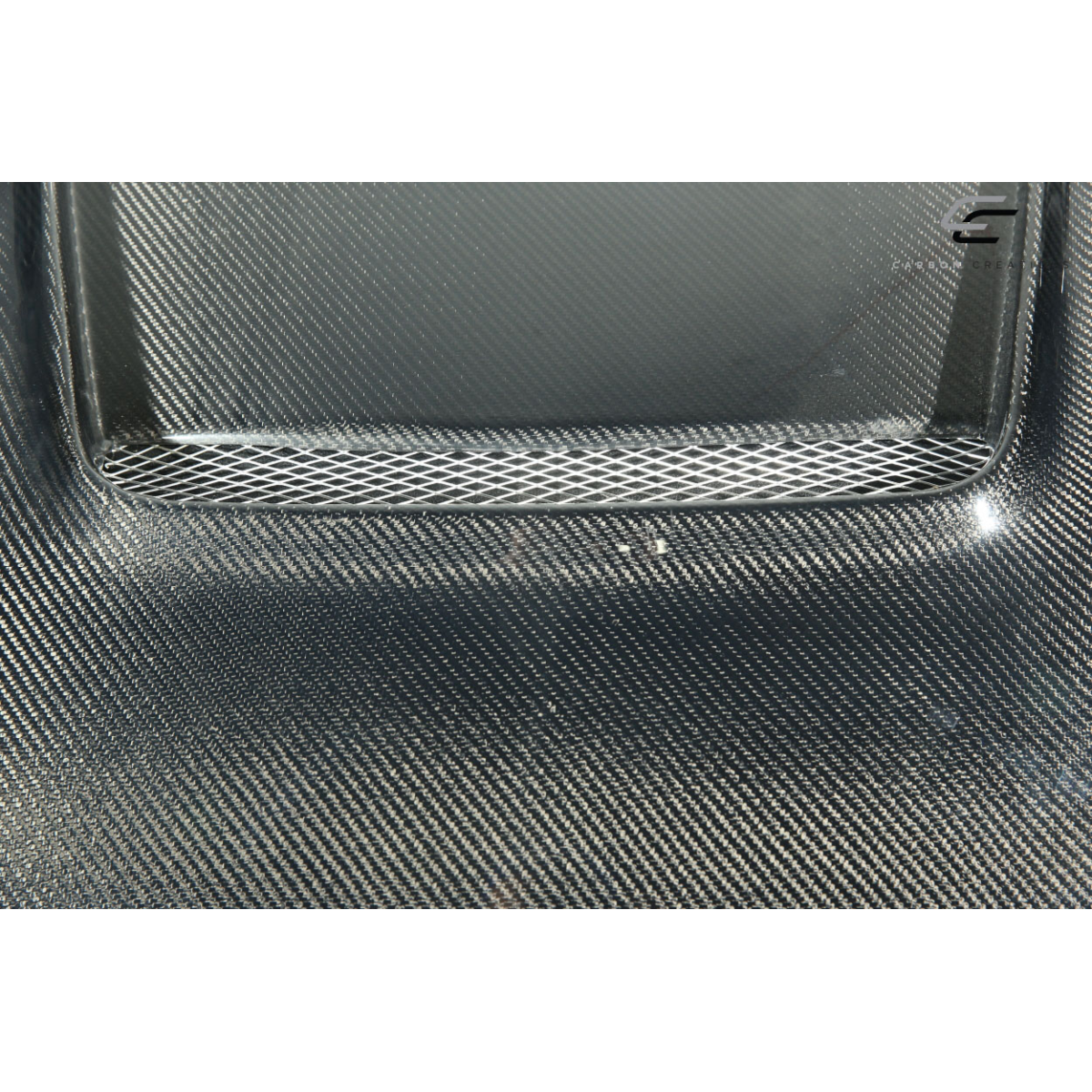 Modify your Mazda Miata 2016 with our Exterior/Hoods - Top view angle of the carbon fiber hood part