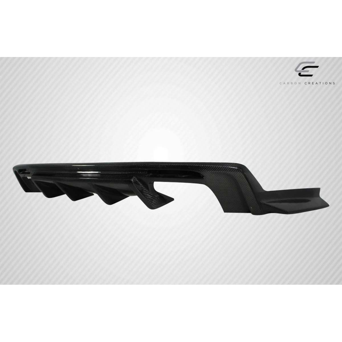 Modify your Chevrolet Camaro 2016 with our Exterior/Diffusers - Side angle view of carbon fiber rear diffuser