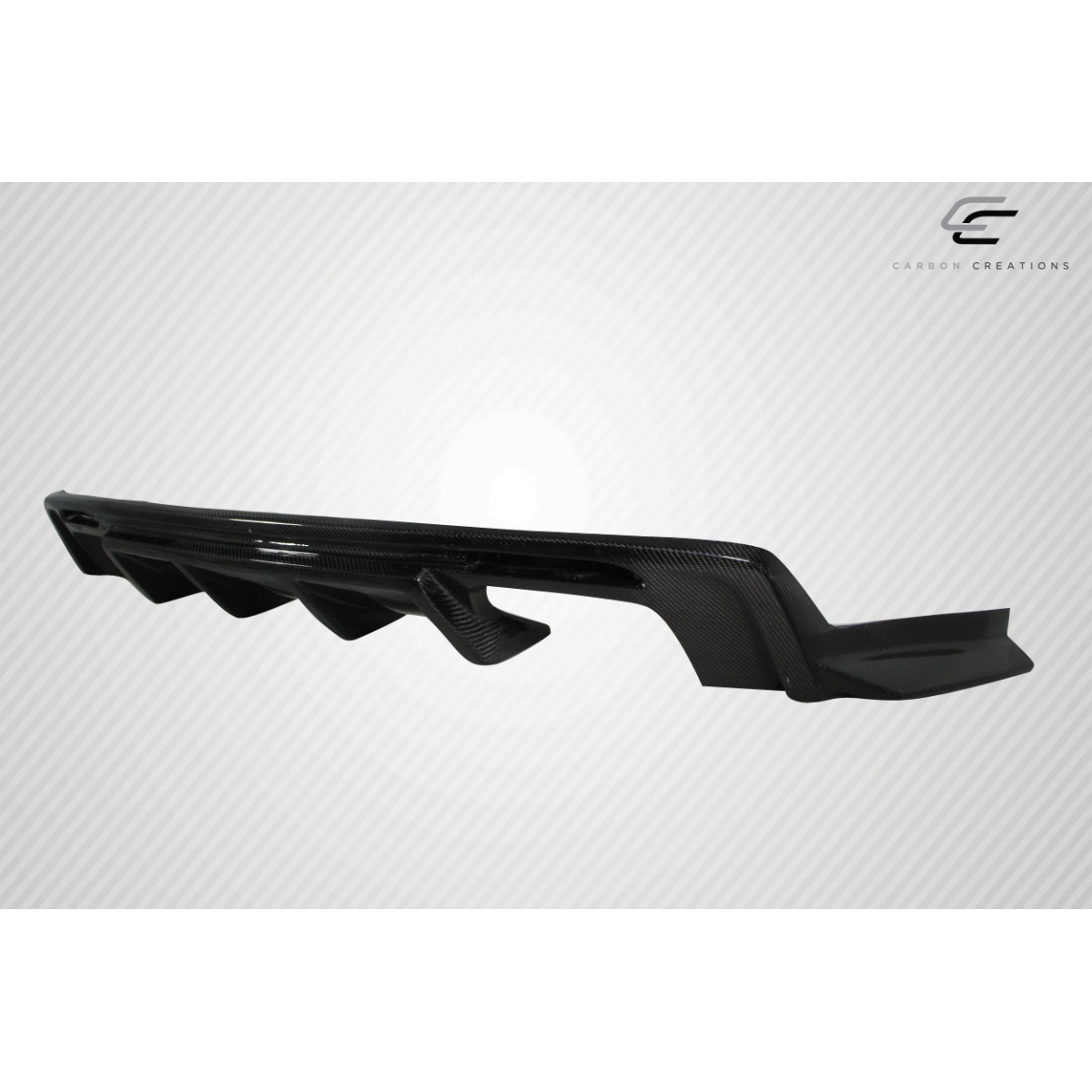 Modify your Chevrolet Camaro 2016 with our Exterior/Diffusers - Side view angle of a carbon fiber rear diffuser