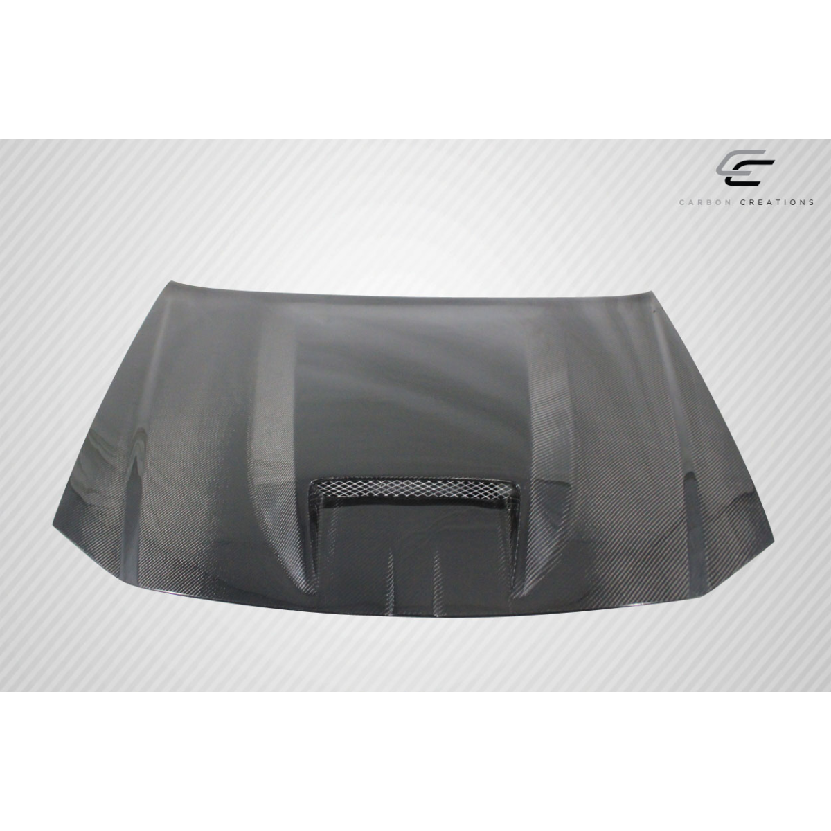 Modify your Dodge Magnum 2005 with our Exterior/Hoods - Front view of the carbon fiber hood part