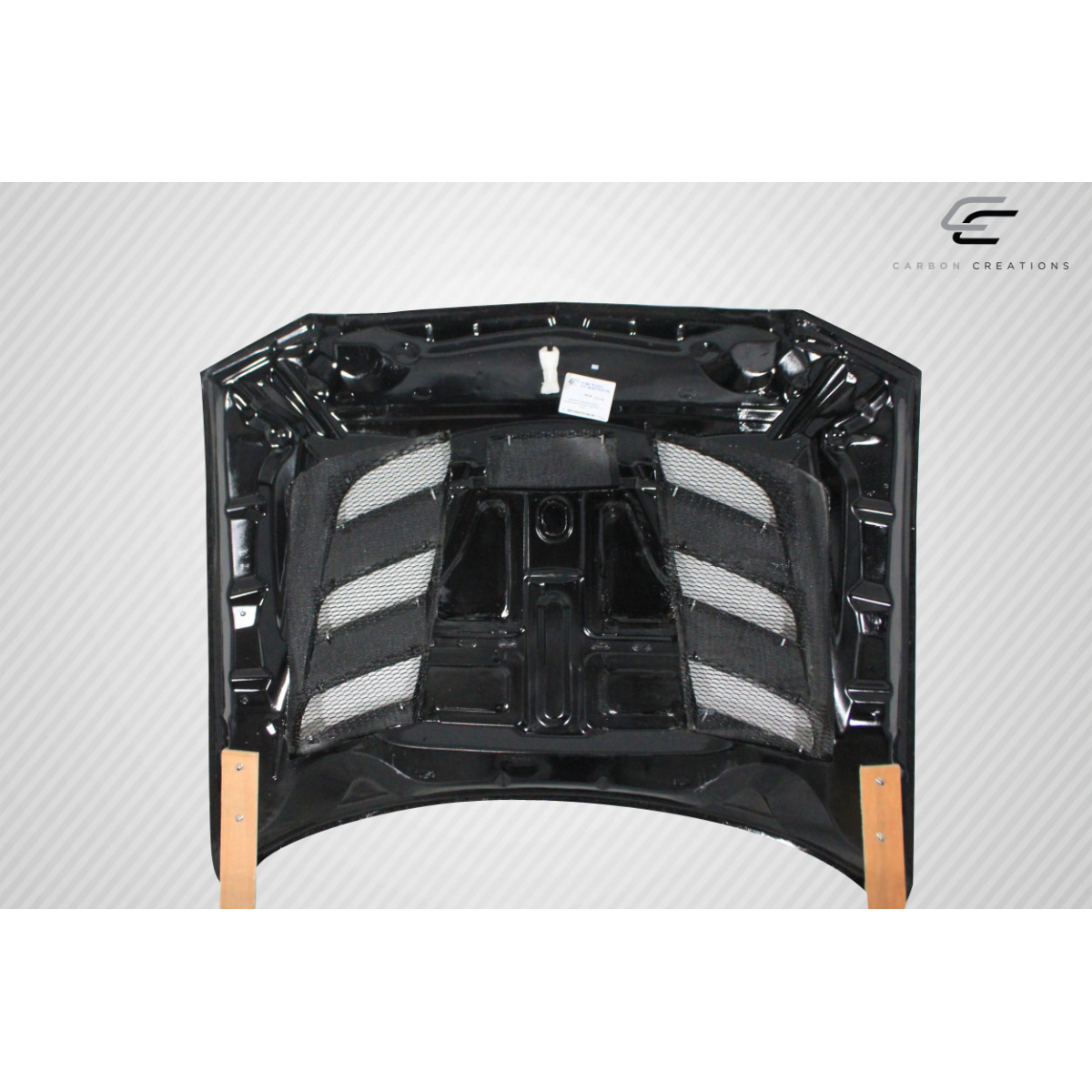 Modify your Dodge Charger 2011 with our Exterior/Hoods - Top view of carbon fiber hood at a flat angle