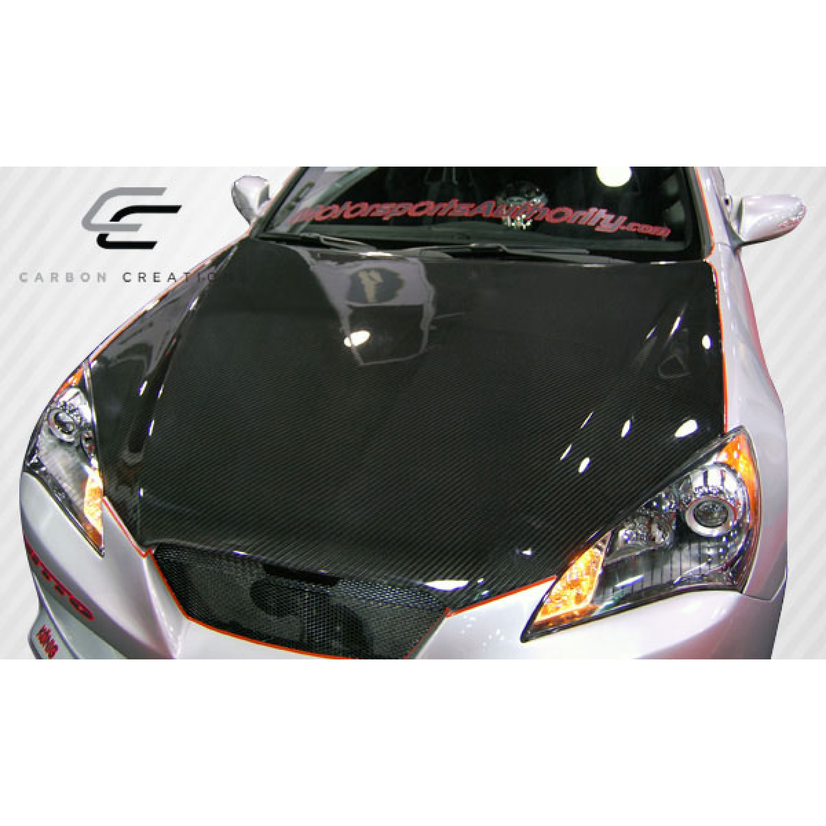 Modify your Genesis G70 2010 with our Exterior/Hoods - Front angle view of carbon fiber hood