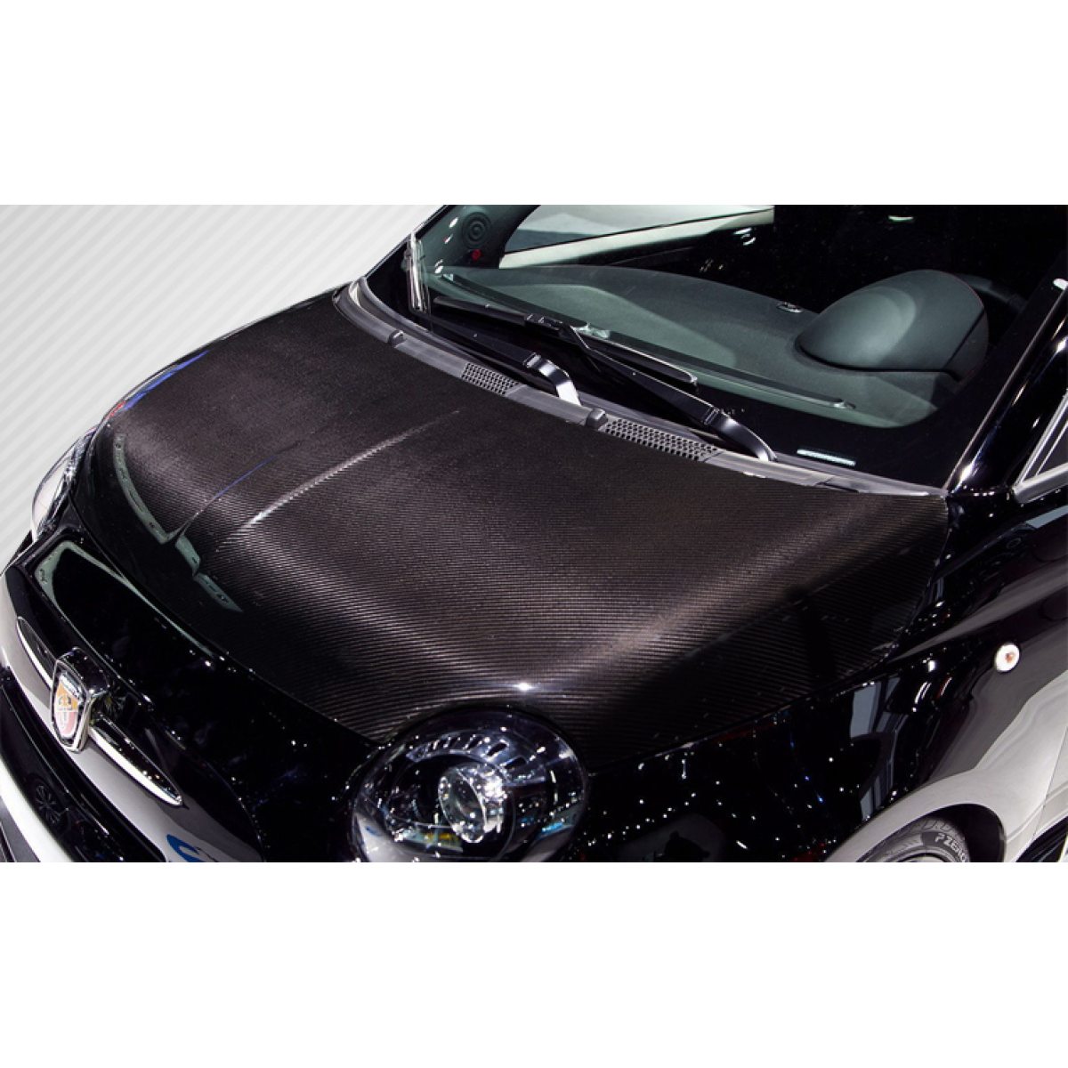 Modify your Fiat 500 2012 with our Exterior/Hoods - Aerial view of car hood at a slight angle