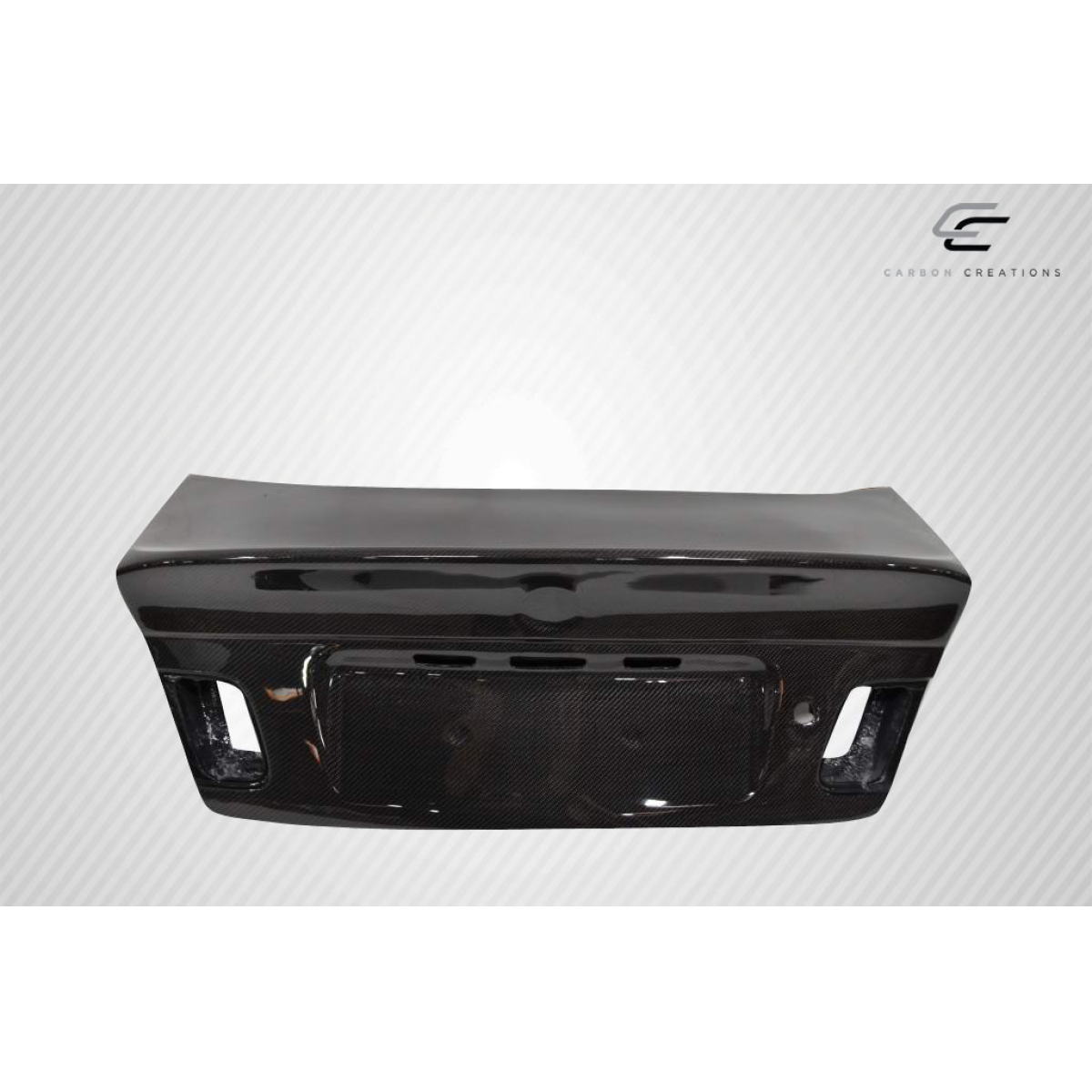 Modify your BMW 3-Series 1999 with our Exterior/Trunks - Angled front view of the trunk part image