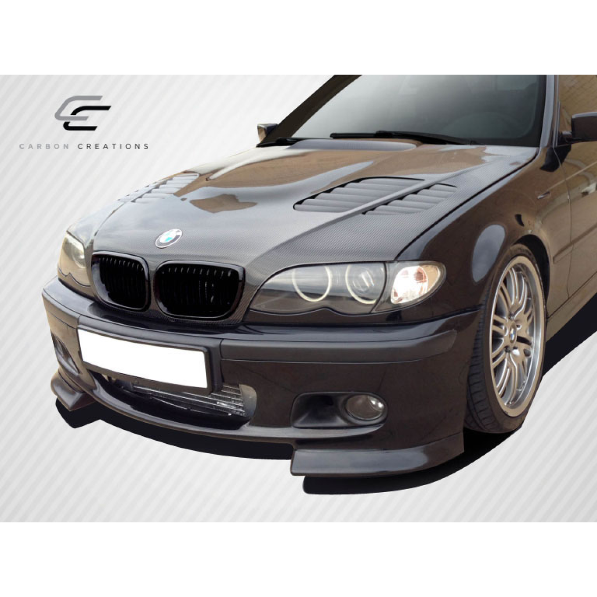 Modify your BMW 3-Series 2002 with our Exterior/Hoods - Front angle view of carbon fiber hood