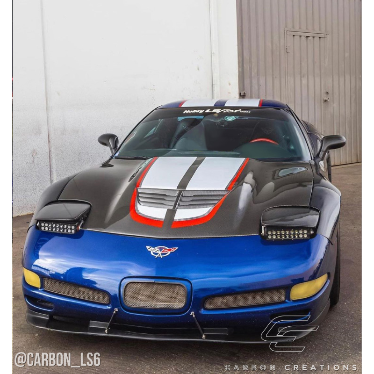 Modify your Chevrolet Corvette 1997 with our Exterior/Hoods - Front angle of a modified Chevrolet Corvette C5