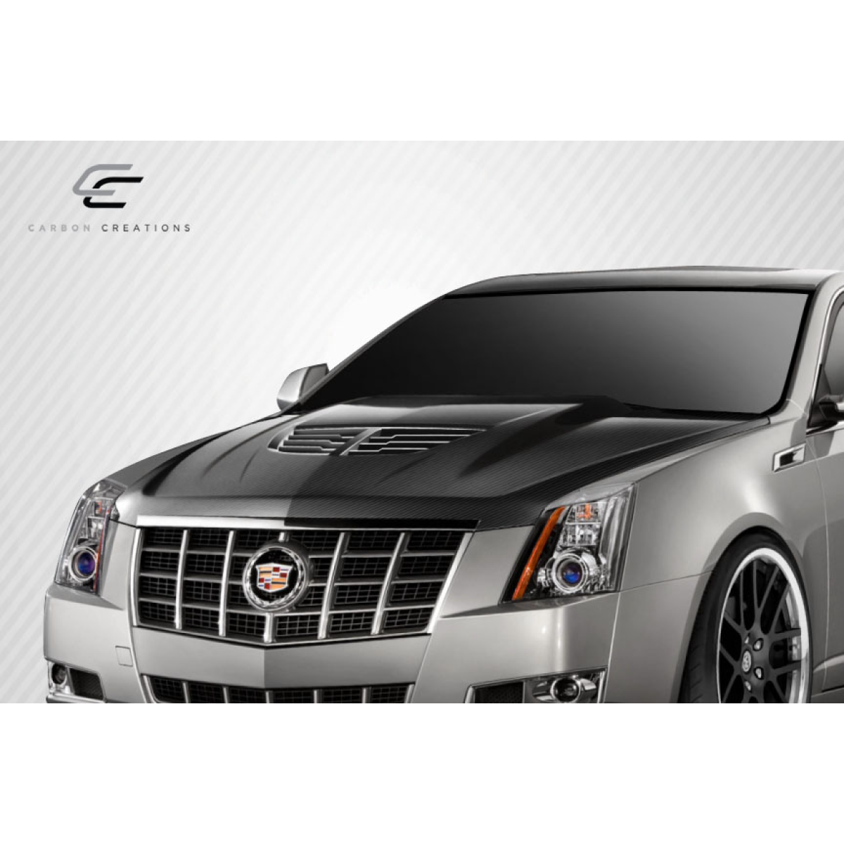Modify your Cadillac CTS 2009 with our Exterior/Hoods - Front angle showing hood and grille of vehicle