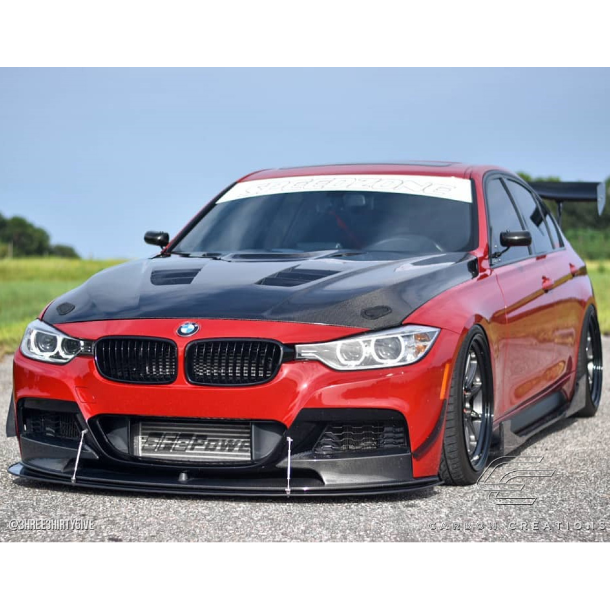 Modify your BMW 3-Series 2012 with our Exterior/Hoods - Front angle view of the BMW car