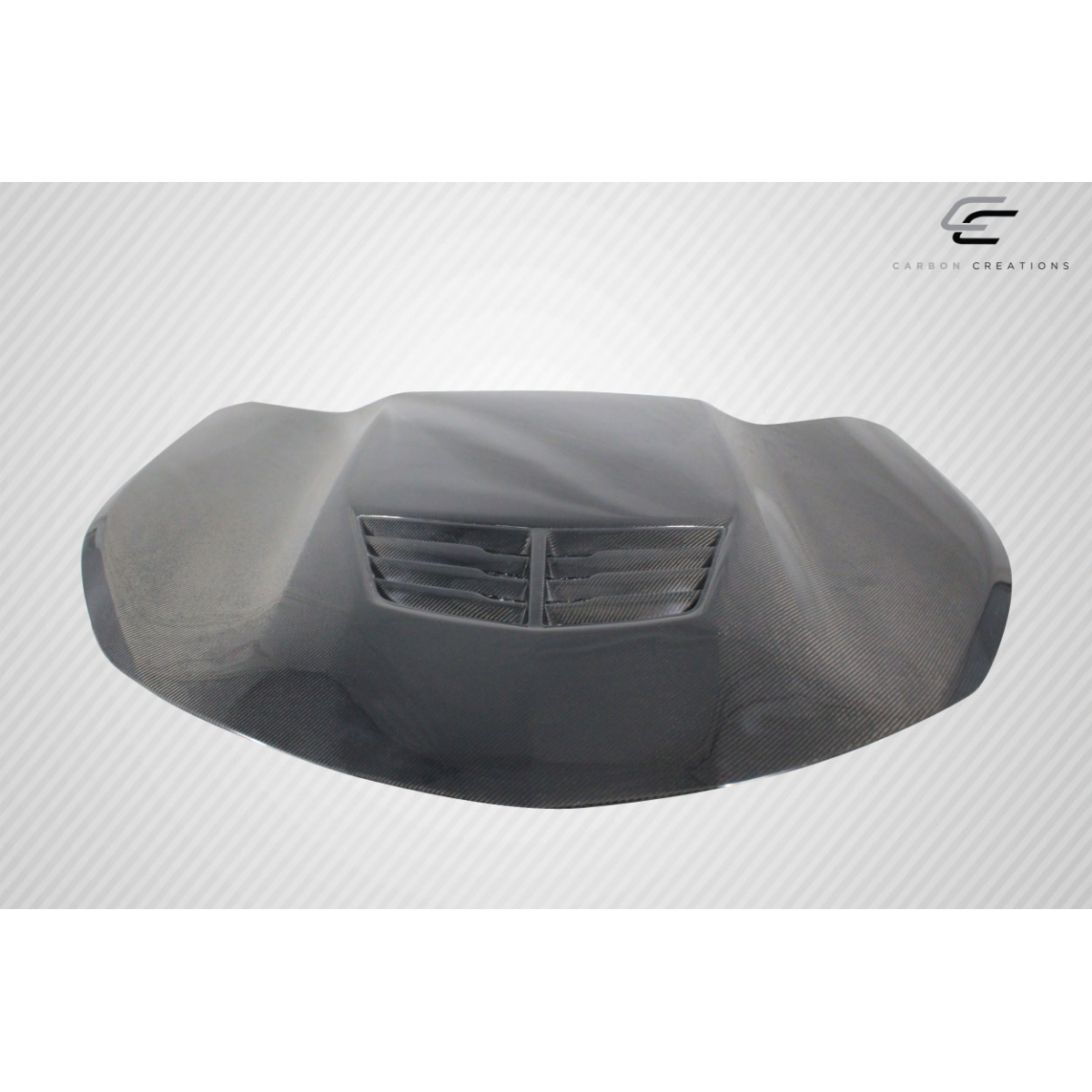 Modify your Chevrolet Camaro 2016 with our Exterior/Hoods - Front angled view of carbon fiber hood