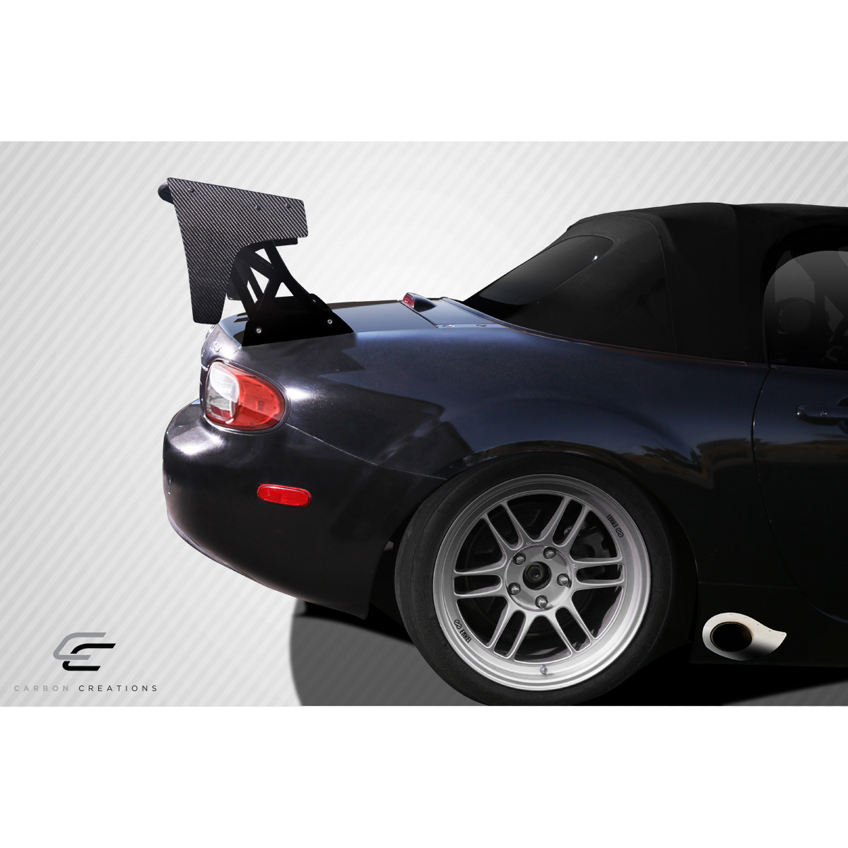 Modify your Universal   with our Exterior/Complete Body Kits - Rear view angle showcasing the wing on a vehicle