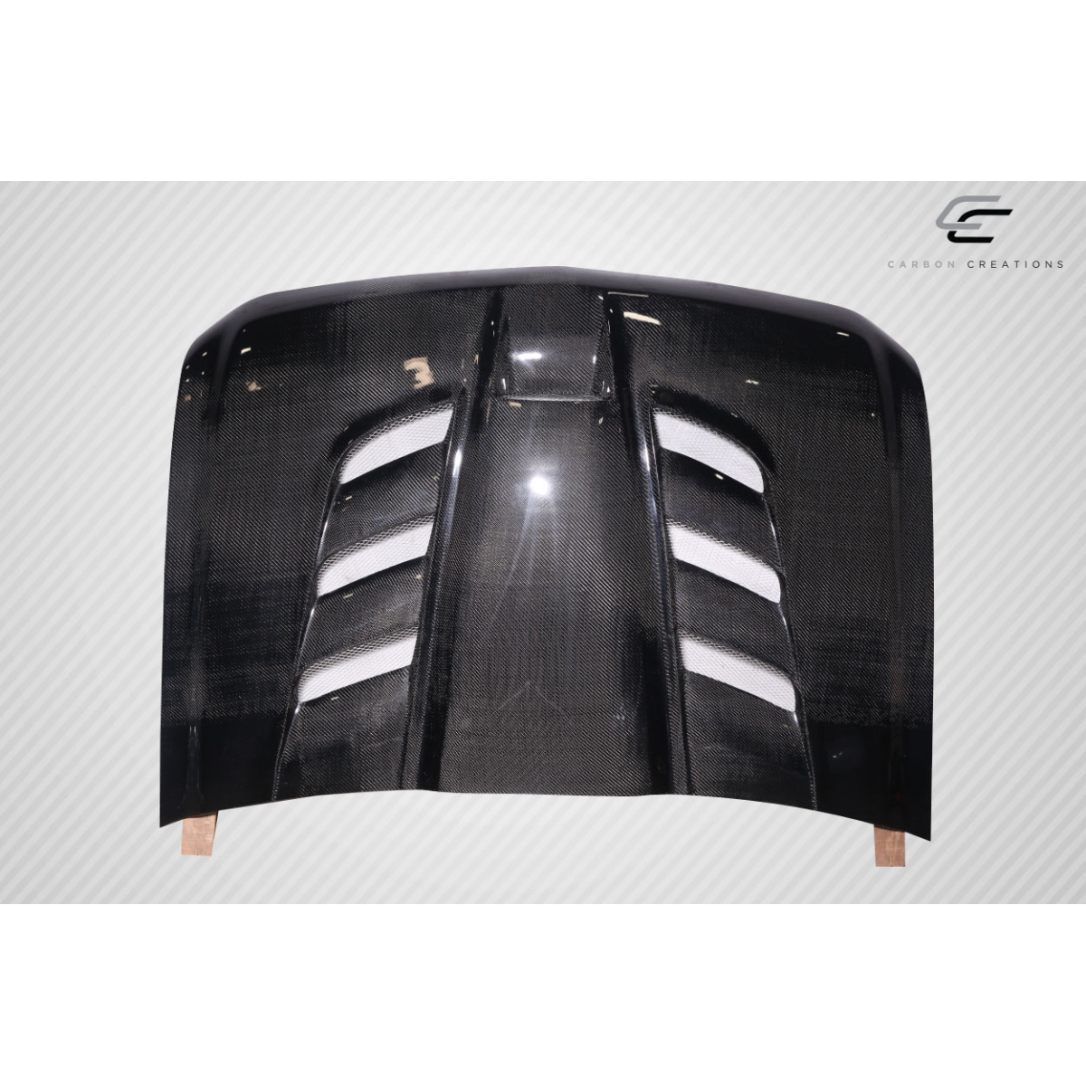 Modify your Chevrolet Silverado 2007 with our Exterior/Hoods - Front view of carbon fiber hood part