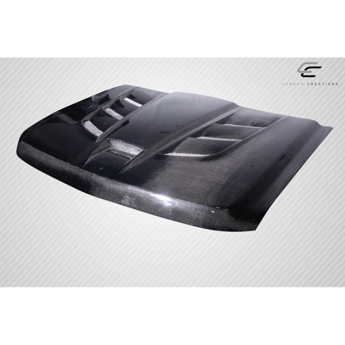 Modify your Chevrolet Silverado 2007 with our Exterior/Hoods - Part is shown at a slight top-down angle