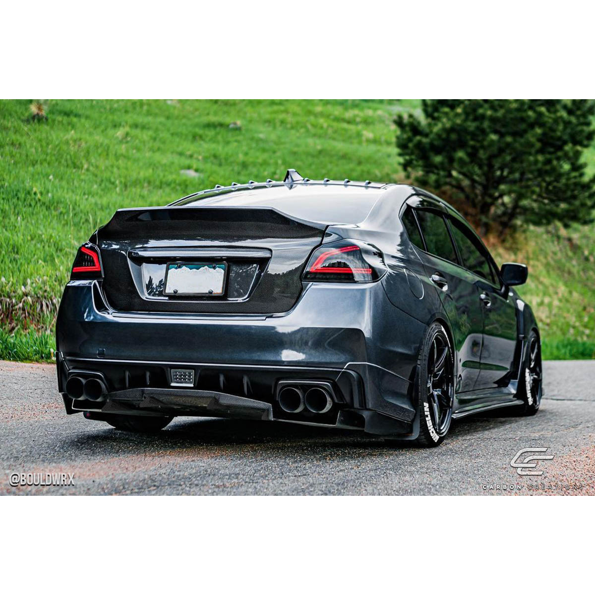 Modify your Subaru Impreza 2015 with our Exterior/Diffusers - Rear angle view showcasing carbon fiber rear diffuser