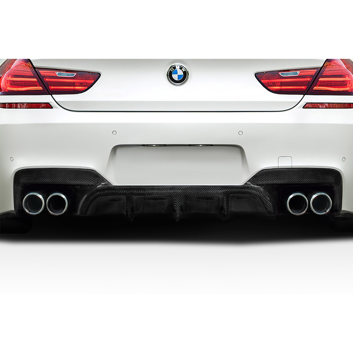 Modify your BMW 6-Series 2011 with our Exterior/Diffusers - Rear view angle displaying diffuser and exhaust tips