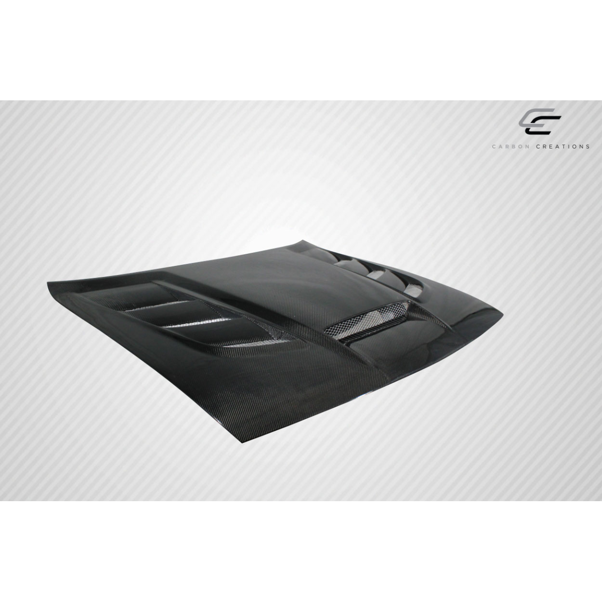 Modify your Dodge Challenger 2008 with our Exterior/Hoods - Angled view of a carbon fiber hood