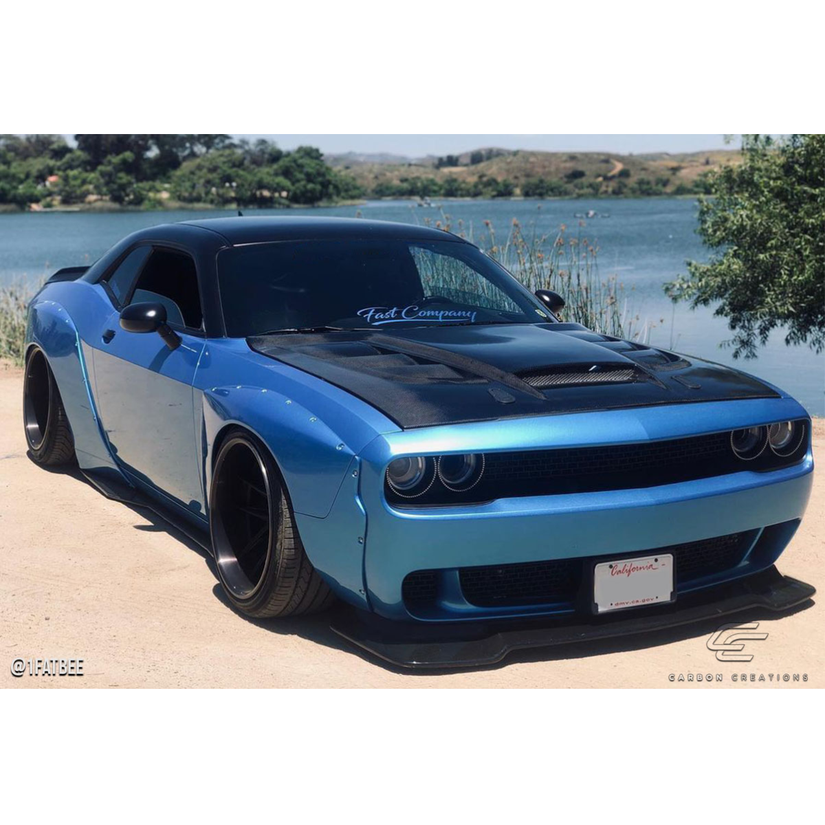 Modify your Dodge Challenger 2008 with our Exterior/Hoods - Front three quarter angle view of the vehicle