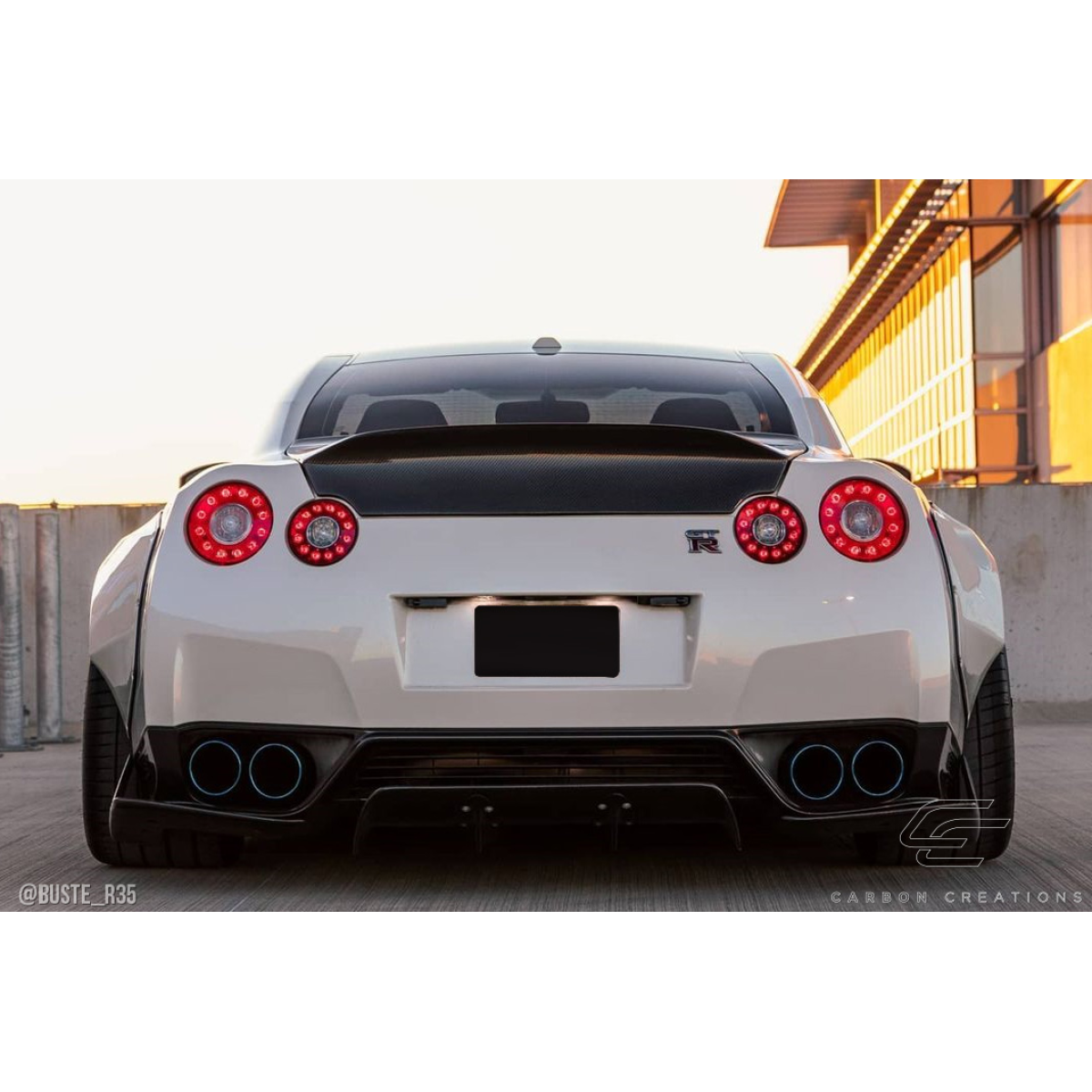 Modify your Nissan GT-R 2009 with our Exterior/Diffusers - Viewed from the rear at a slight upward angle