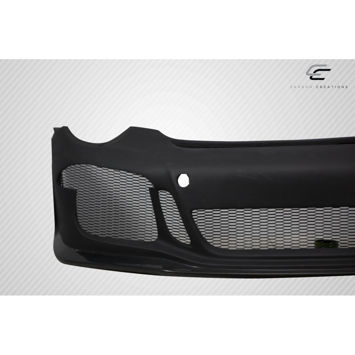 Modify your Porsche 911 2012 with our Exterior/Front Bumpers or Lips - Part shown at a slightly angled frontal view