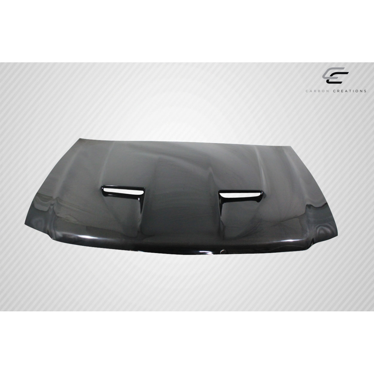 Modify your Ford F-150 1997 with our Exterior/Hoods - Front view of carbon fiber hood at slight angle