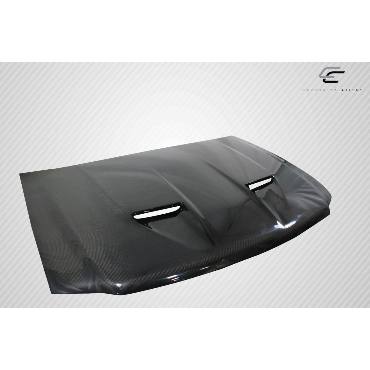 Modify your Ford F-150 1997 with our Exterior/Hoods - Front view of carbon fiber hood at slight angle