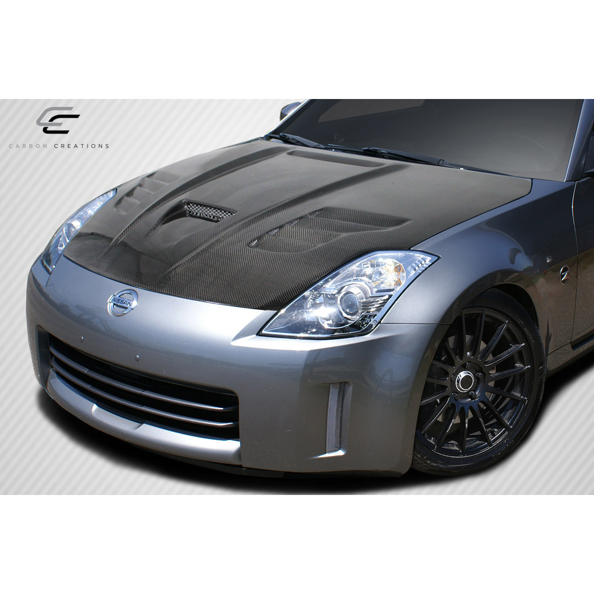 Modify your Nissan 350Z 2003 with our Exterior/Hoods - Front angle of a Nissan 350Z with carbon fiber hood