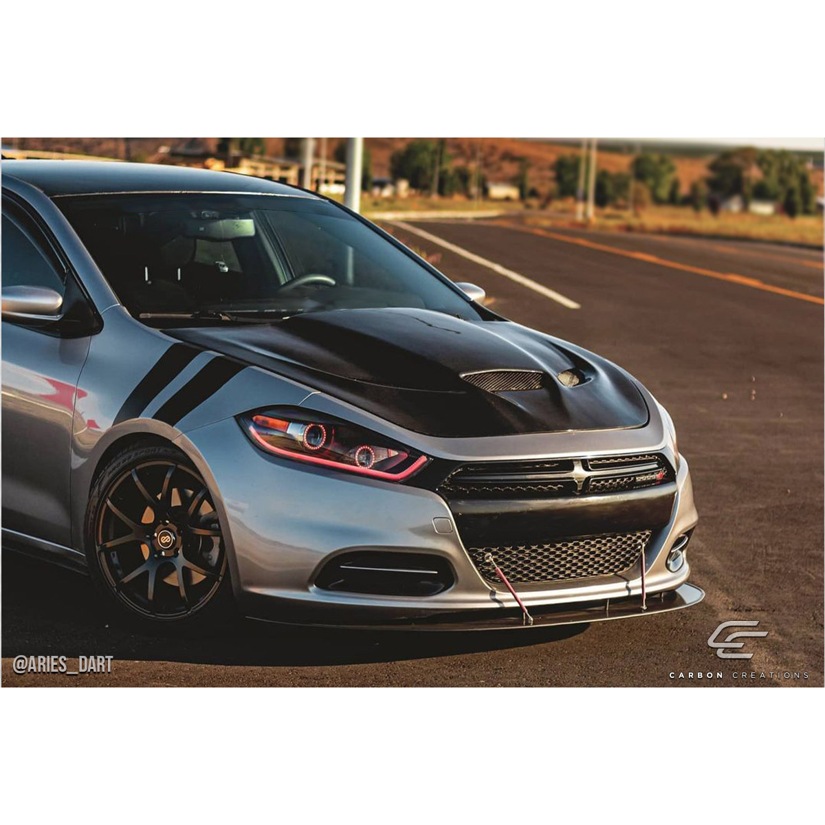 Modify your Dodge Dart 2013 with our Exterior/Hoods - Front angle showcasing hood details and design