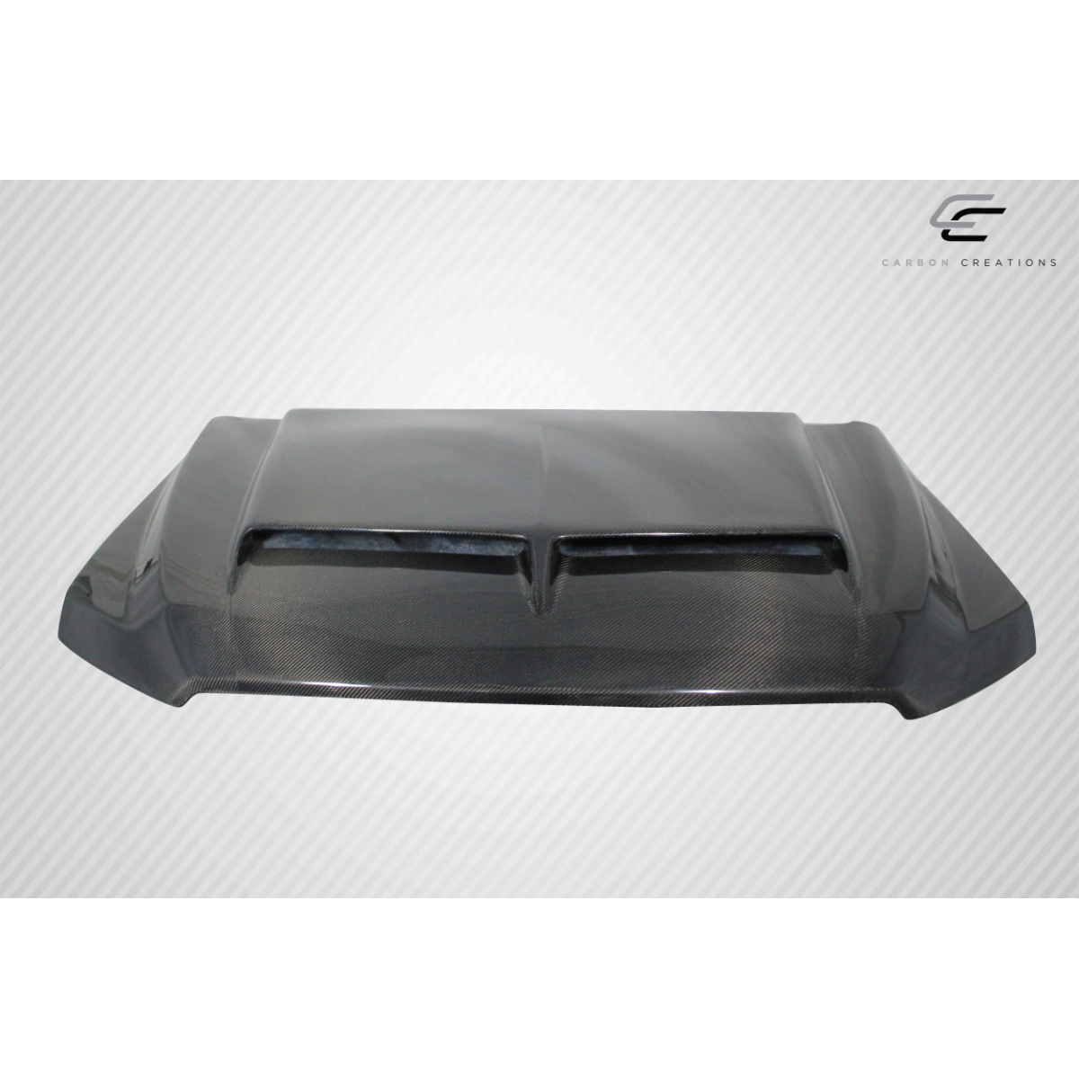 Modify your Ford F-150 2015 with our Exterior/Hoods - Front angle view of carbon fiber hood part