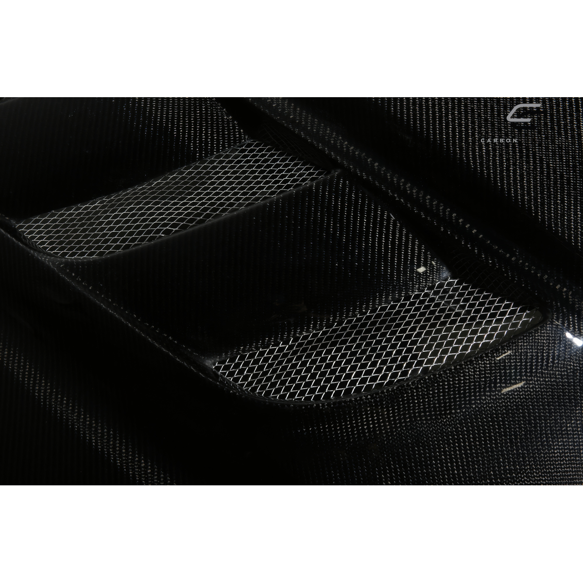 Modify your Toyota Tacoma 2012 with our Exterior/Hoods - Angled view showing vent and carbon fiber texture