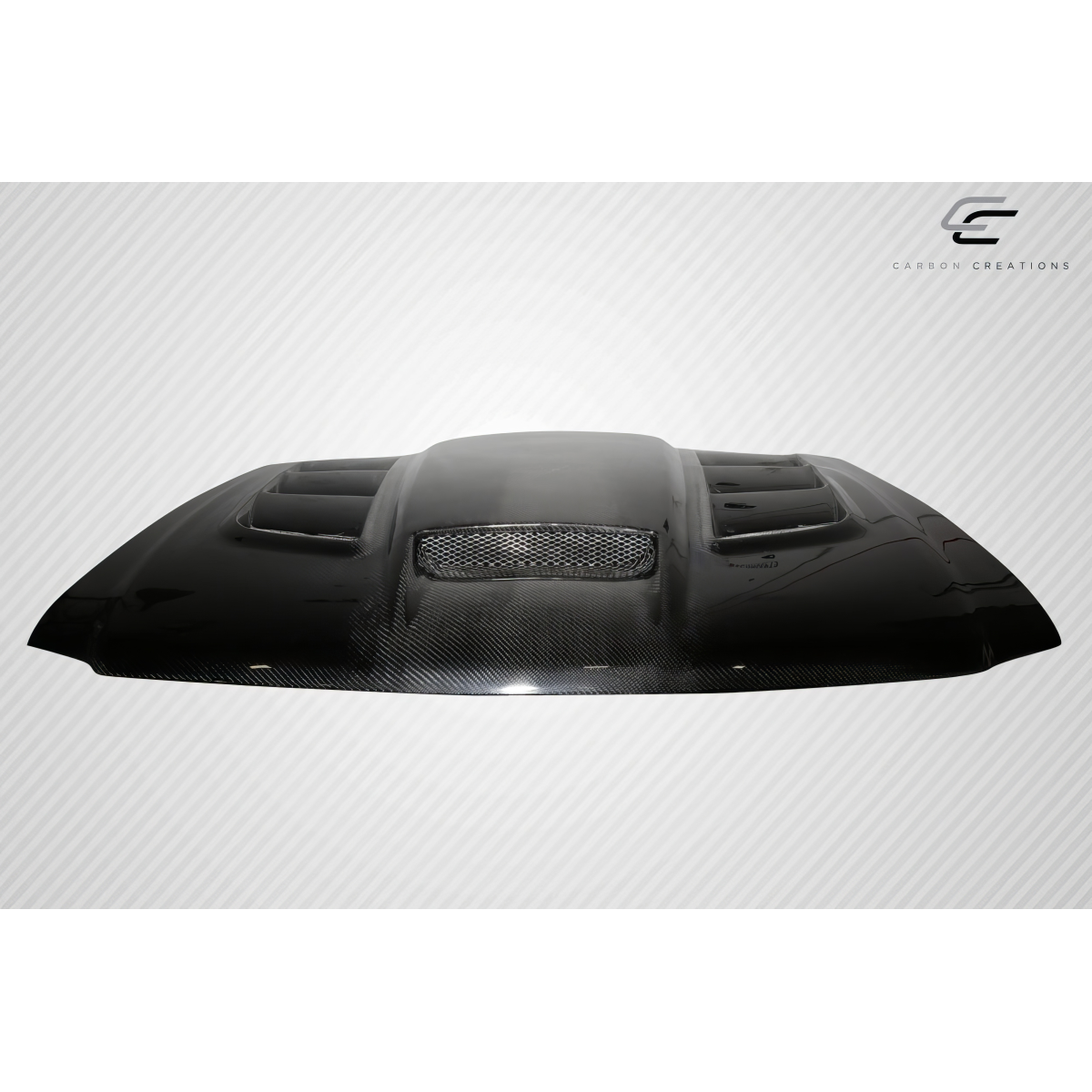 Modify your Ford F-150 1997 with our Exterior/Hoods - Top view of a carbon fiber hood at flat angle