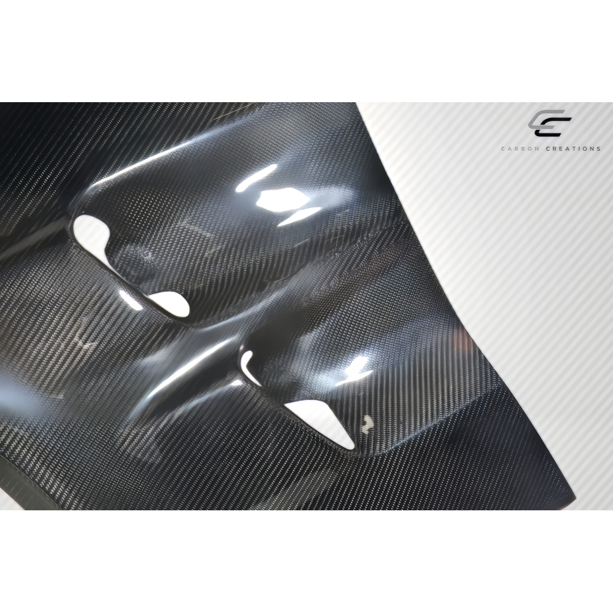 Modify your Chevrolet Corvette 2005 with our Exterior/Fenders - Part angled diagonally showing carbon fiber texture