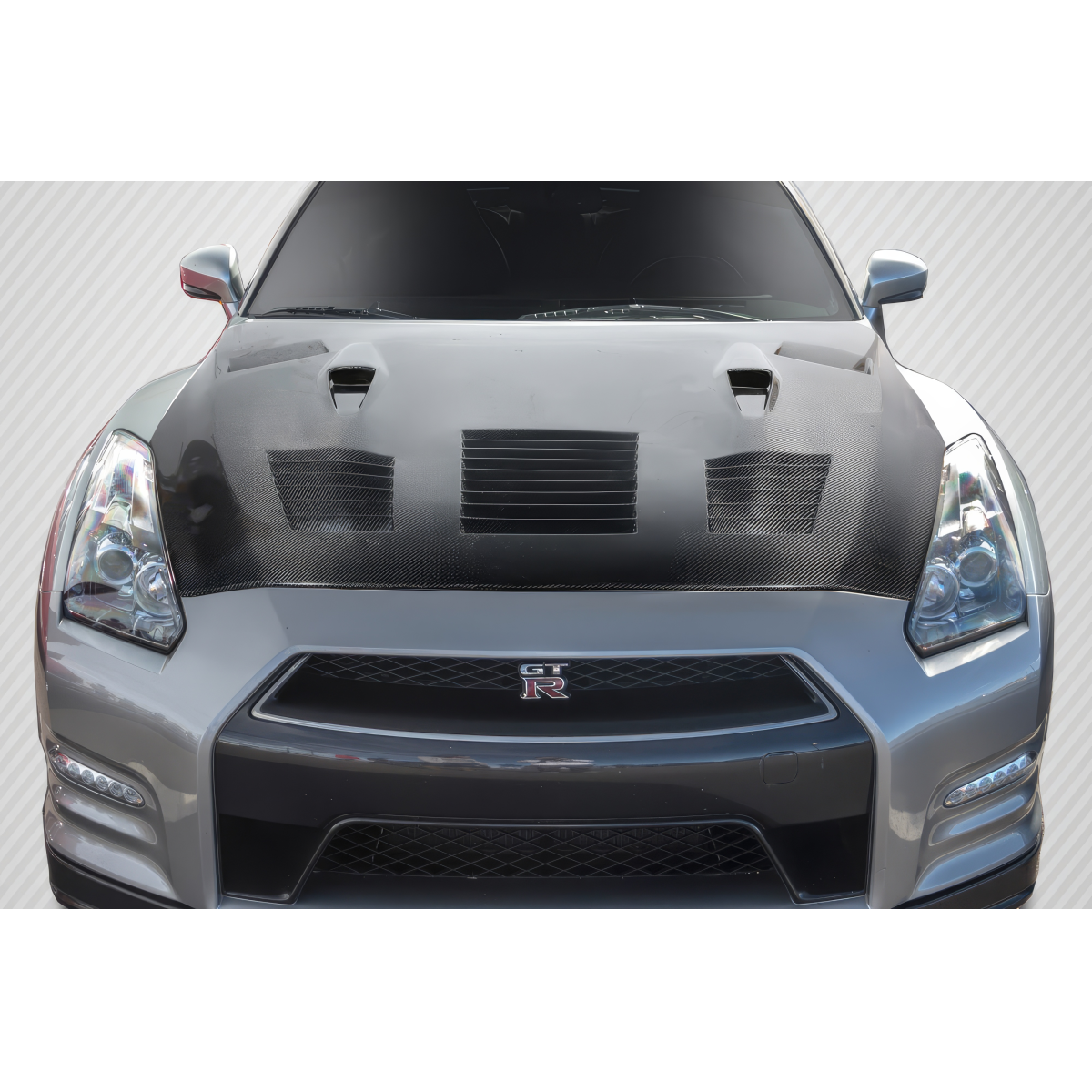 Modify your Nissan GT-R 2009 with our Exterior/Hoods - Front view of carbon fiber hood at eye level