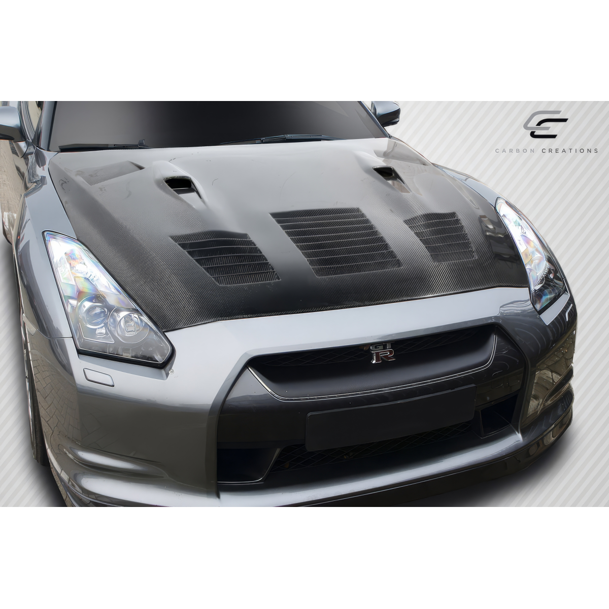 Modify your Nissan GT-R 2009 with our Exterior/Hoods - Top down view of car hood at slight angle