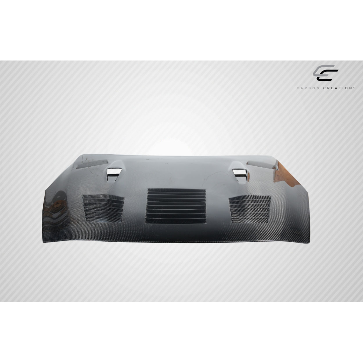 Modify your Nissan GT-R 2009 with our Exterior/Hoods - Top down view of carbon fiber hood at slight angle