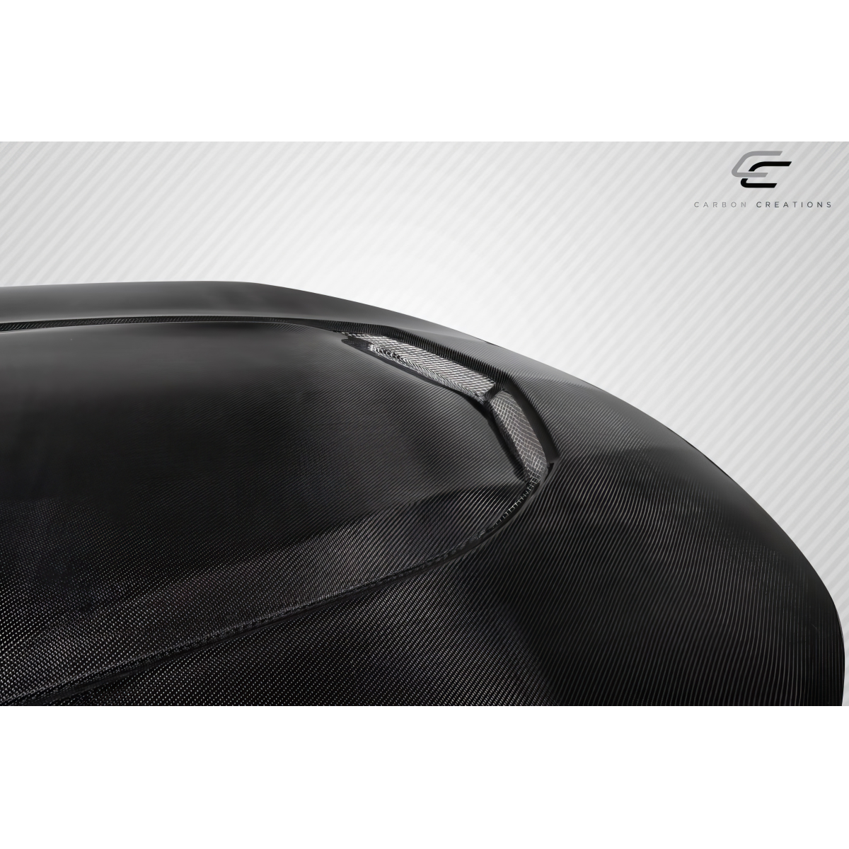 Modify your Chevrolet Camaro 2016 with our Exterior/Hoods - Angled view showcasing the carbon fiber hood