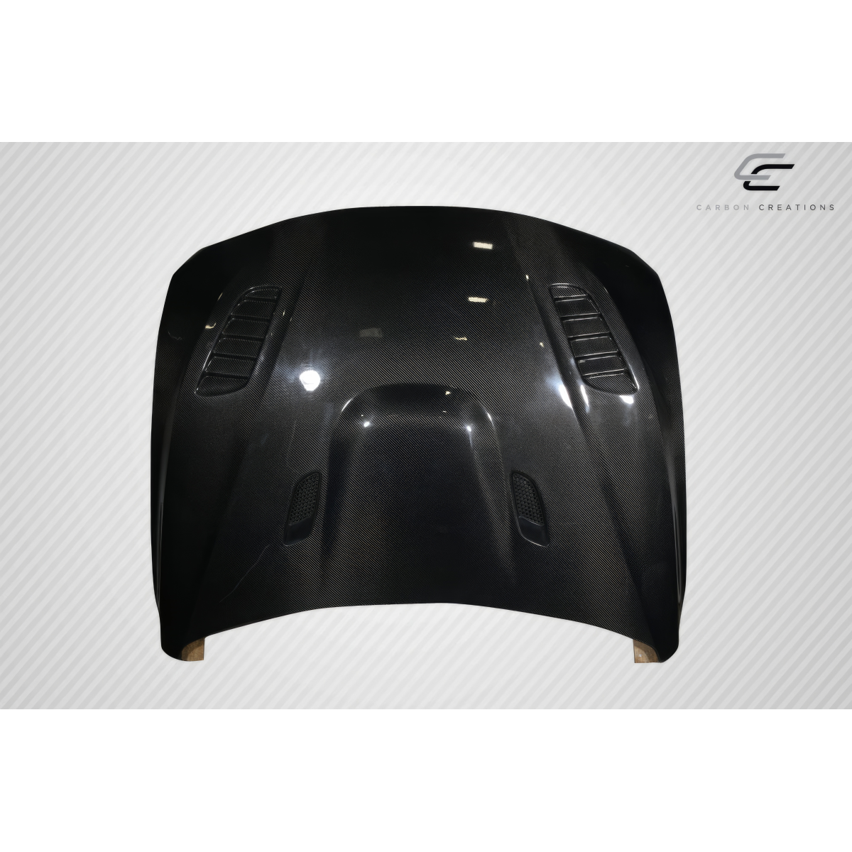 Modify your BMW 3-Series 2012 with our Exterior/Hoods - Front view of the hood at a slight angle