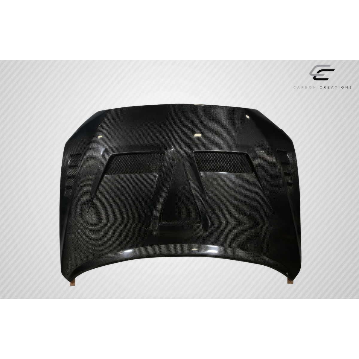 Modify your Mitsubishi Evolution 2008 with our Exterior/Hoods - Frontal view of a carbon fiber race hood