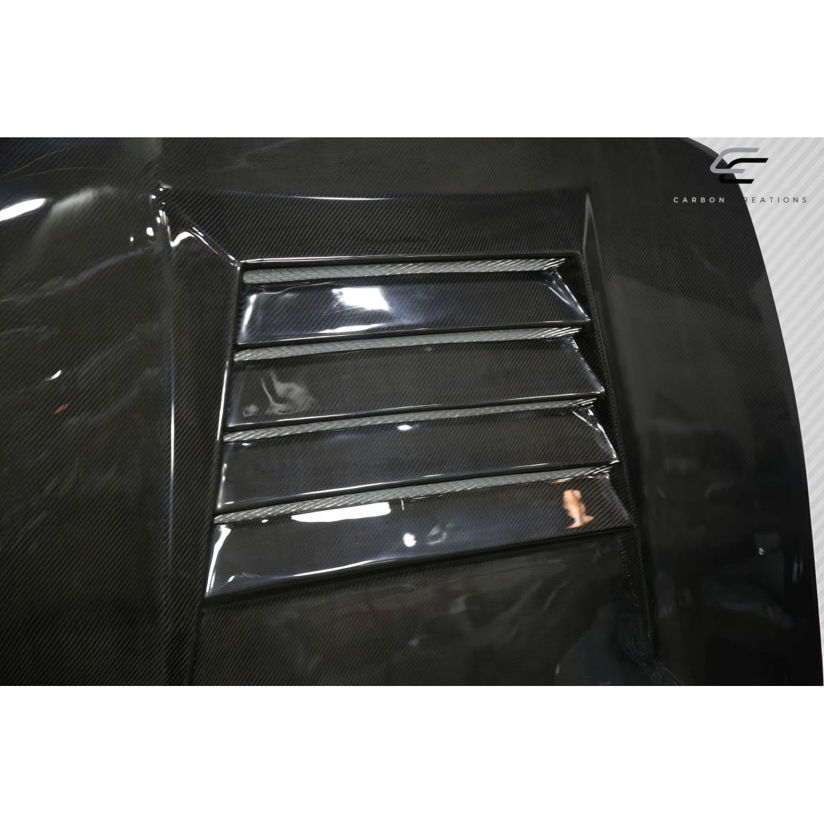 Modify your Nissan 240SX 1995 with our Exterior/Hoods - Image of car part viewed from a slight angle