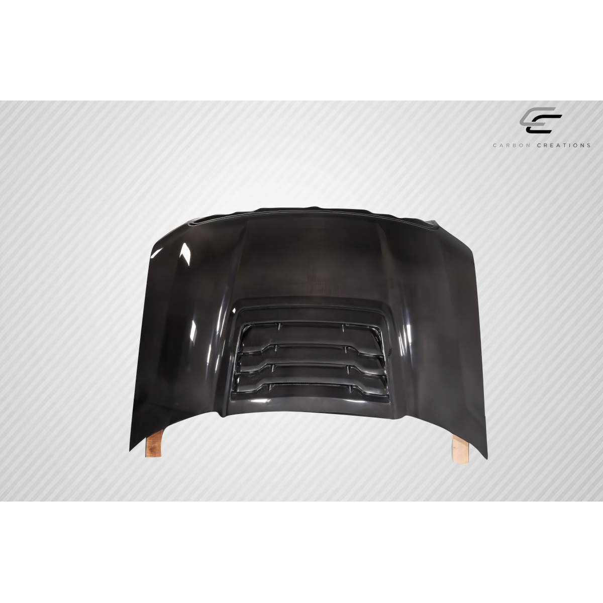 Modify your Ford F-150 2009 with our Exterior/Hoods - Front view of carbon fiber hood at eye level