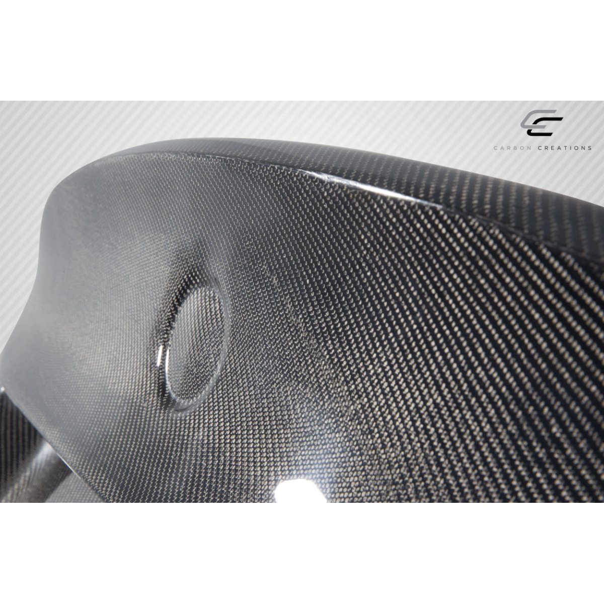 Modify your BMW 3-Series 2009 with our Exterior/Trunks - Angle showing close up of carbon fiber surface