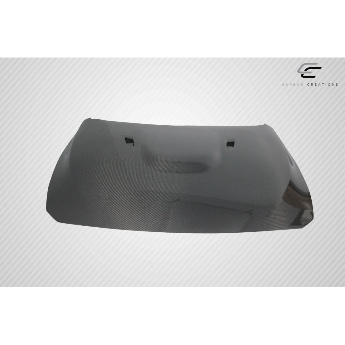 Modify your BMW 3-Series 2012 with our Exterior/Hoods - Front view of carbon fiber hood at slight angle