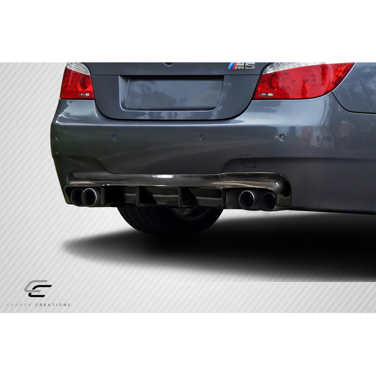 Modify your BMW 5-Series 2004 with our Exterior/Diffusers - Rear angle showcasing carbon fiber diffuser