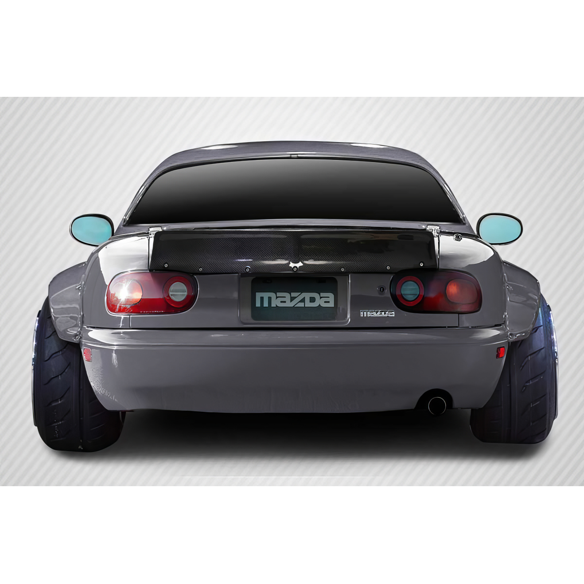 Modify your Mazda Miata 1990 with our Exterior/Wings - Rear view angle showcasing a car spoiler