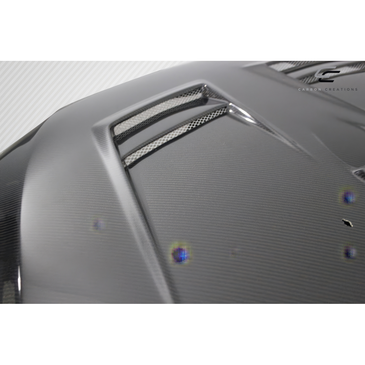 Modify your Mitsubishi Evolution 2008 with our Exterior/Hoods - Angled view of carbon fiber hood from above