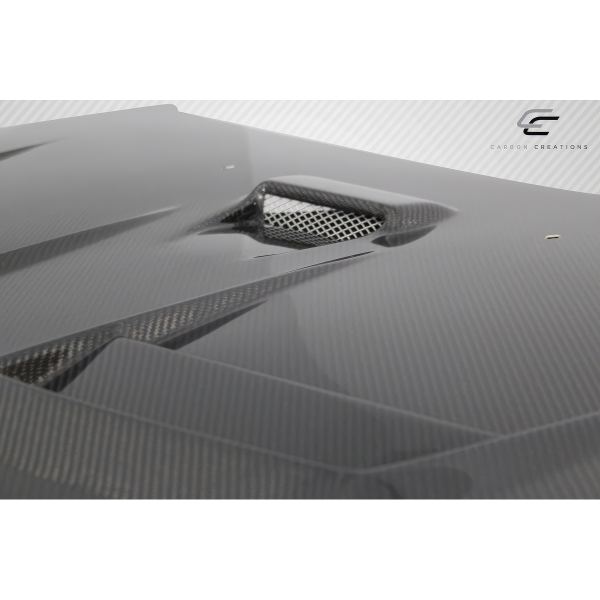 Modify your Mitsubishi Evolution 2008 with our Exterior/Hoods - Angled view showing carbon fiber hood design