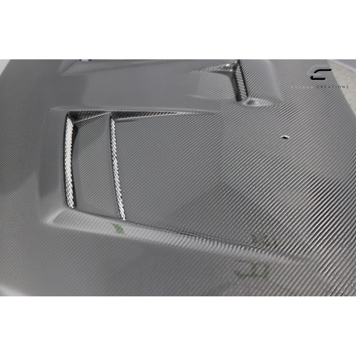 Modify your Mitsubishi Evolution 2008 with our Exterior/Hoods - Part viewed from a top down angle