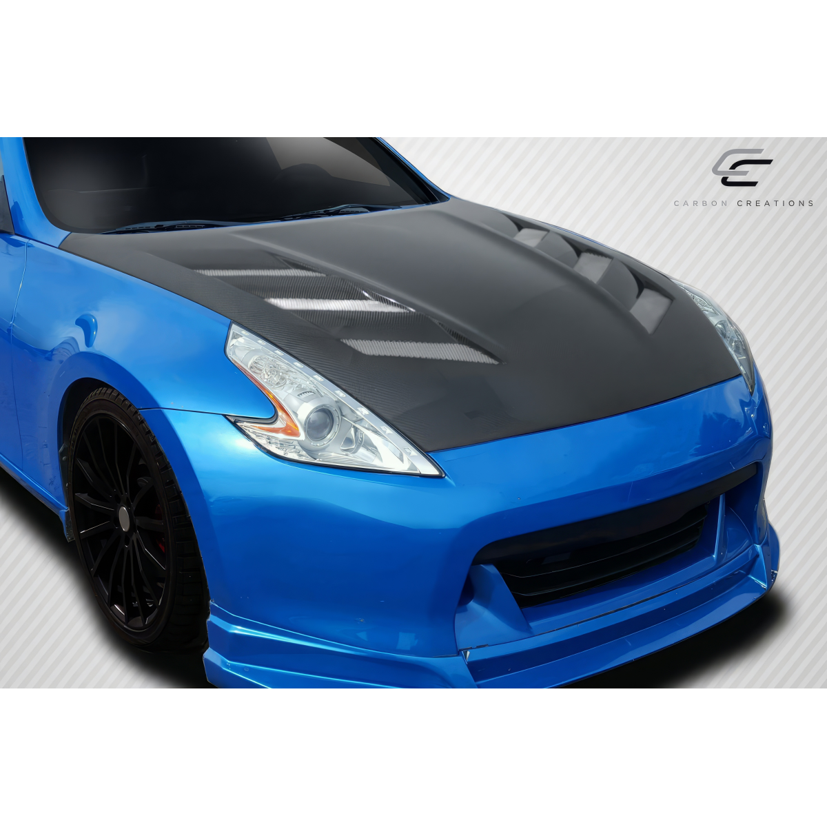 Modify your Nissan 370Z 2009 with our Exterior/Hoods - Front angle view of carbon fiber hood