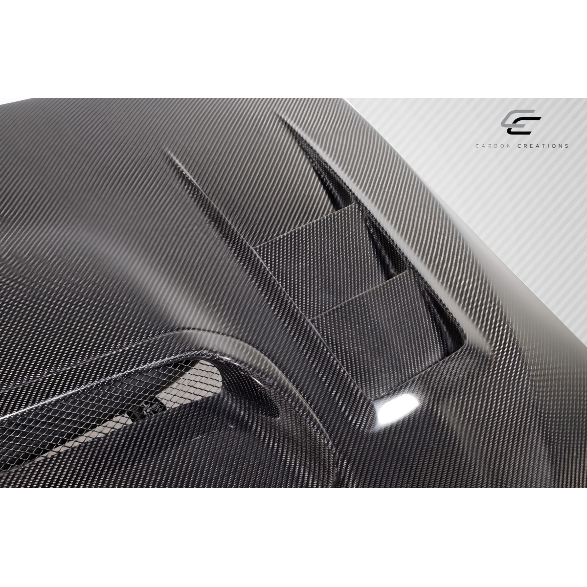 Modify your Subaru WRX 2015 with our Exterior/Hoods - Angled view showcasing carbon fiber texture